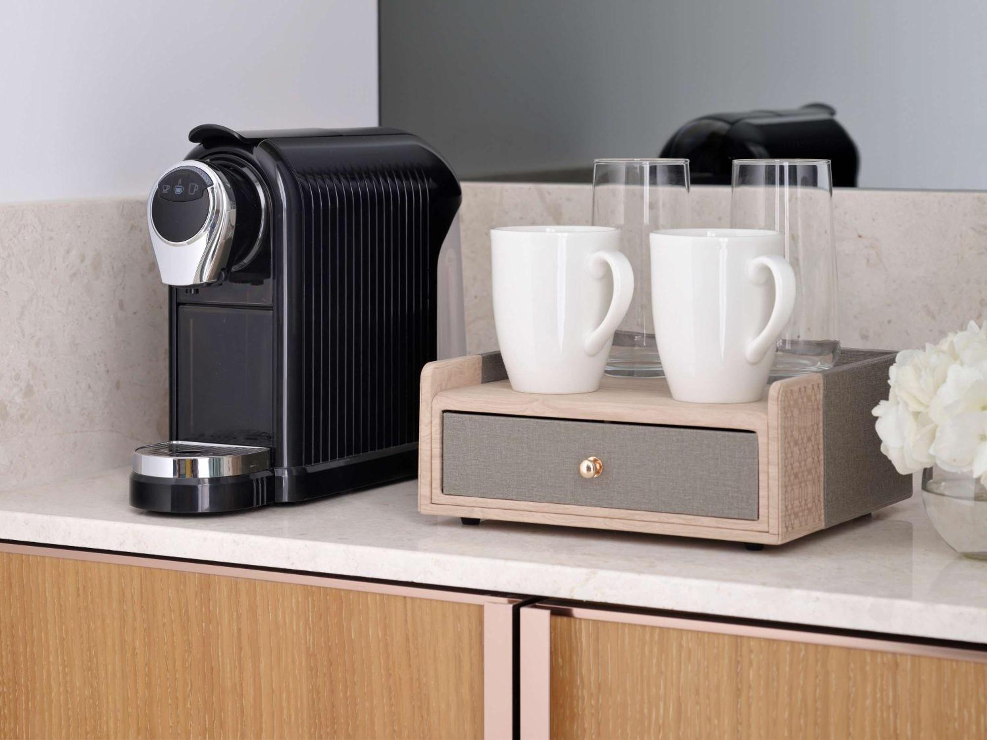 Moevenpick Hotel & Apartments Ghala Maskat Zewnętrze zdjęcie A Nespresso coffee machine