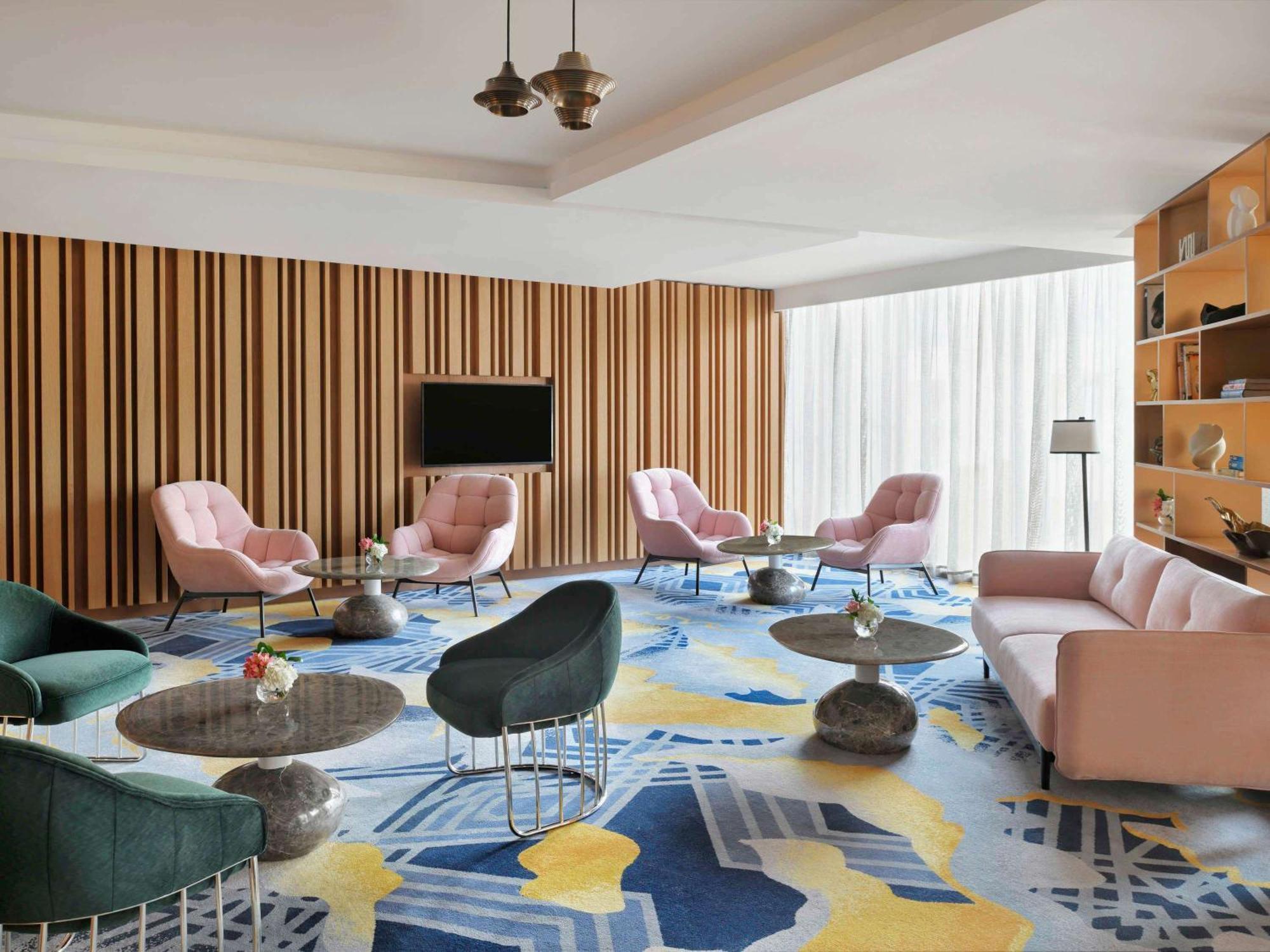 Moevenpick Hotel & Apartments Ghala Maskat Zewnętrze zdjęcie The Living Room
