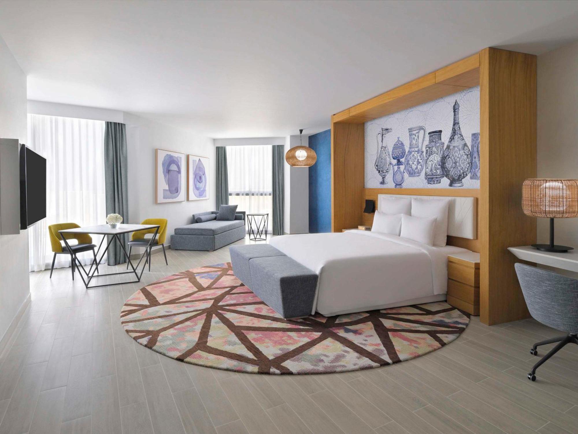 Moevenpick Hotel & Apartments Ghala Maskat Zewnętrze zdjęcie A room at the hotel